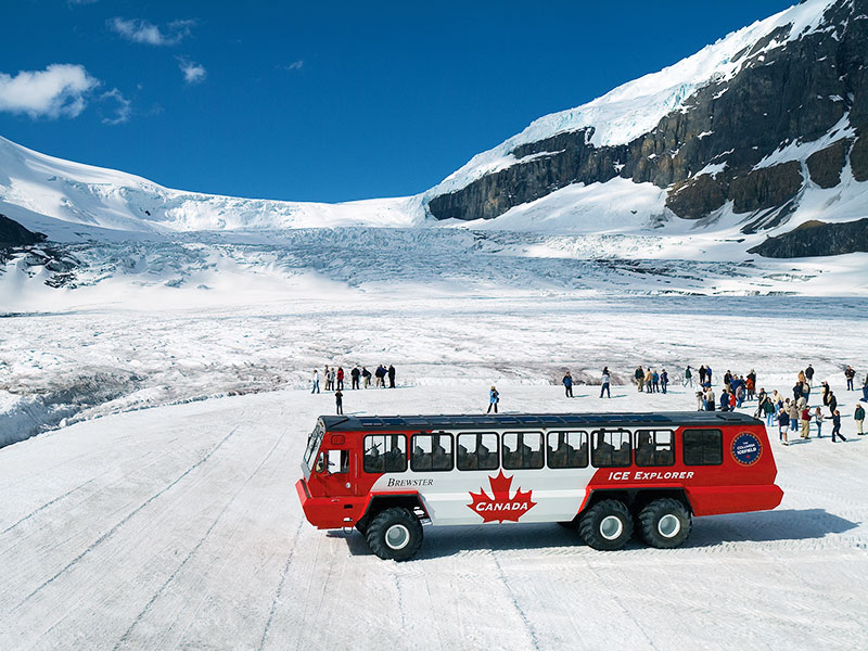Canadian Rockies Train Circle Tour | Ice Explorer ride onto Athabasca Glacier